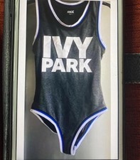 BODYSUIT WOMEN’S UK SIZE XXS APPROX UK SIZE  8/10 IVY PARK GREY MOFIT & POPPERS