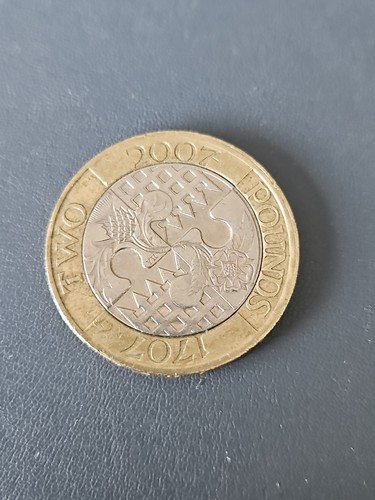 Two pounds coin act - two,