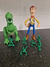 Toy story action figures woody rex and soldiers.