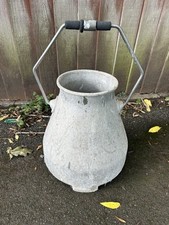 Vintage galvanised milk