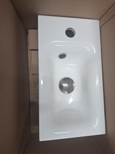 En-suite/ Cloakroom sink and Cabinet