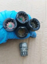 BMW E39 5 SERIES  SET OF FOUR LOCKING WHEEL NUTS AND KEY.