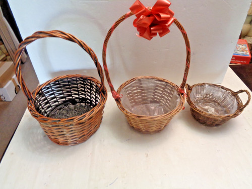 Three wicker woven baskets - wicker,