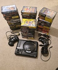 Sega 16 Bit Mega Drive Pal with 2 controllers and 42 boxed games