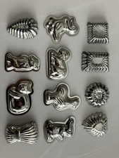 12 X TIN CHOCOLATE MOULDS OLD VINTAGE CONFECTIONERY SWEETS