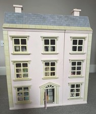 Dolls house and contents - dolls,