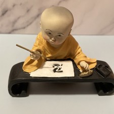 Shaolin Monk Sitting Writing