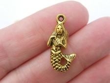 32 Mermaid charms antique gold tone FF634