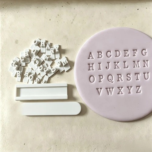 Pottery alphabet stamping tool - pottery,