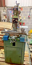Emco milling machine on a cabinet with accessories lathe chuck collet chucks