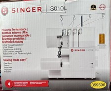 Singer S010L Overlocker Sewing Machine with Pedal and Instructions