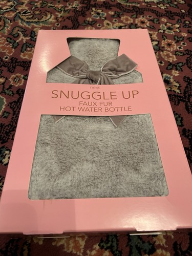 Next snuggle hot water - hot,