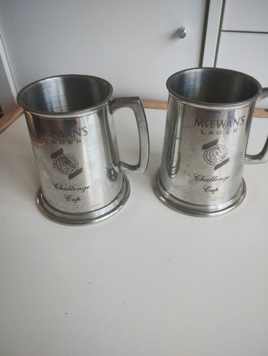 Pair pewter tankards - of,