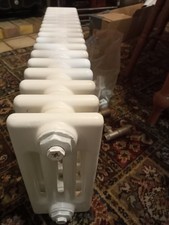 4 Columb Radiator With Support Brackets And 2 Brushed Chrome Radiator Valves.