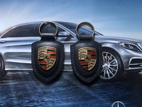 Two genuine porsche - genuine, keyrings