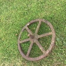 Vintage old cast iron metal wheelbarrow trolley cart wagon wheel garden feature 