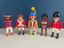 Assorted Playmobil figures - pirate, soldier, clown, bikini clad girl and rider