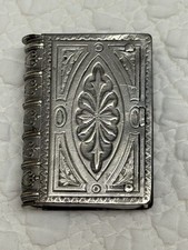 ANTIQUE BOOK SHAPED MATCH