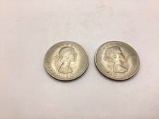 Two Uncirculated 1967 Half Crown Coins In Plastic Wallets.
