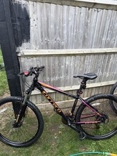 Carrera Vulcan Mountain Bike 27.5 Wheels Pink and Orange Good Condition