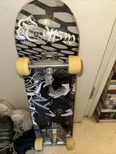 Skateboard Custom grip design good condition cross bolted on top 