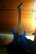 Jackson JS Series Electric Guitar Metallic Blue in Gig Bag. Bridge hard- tailed