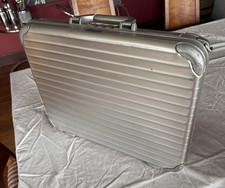 Rimowa slim attache case with shoulder strap. Great Condition.