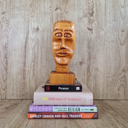 Hand carved wooden head - hand,