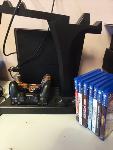 Playstation with games - with,