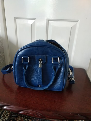 Medium blue handbag featuring - blue,