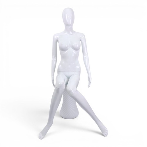 White seated female - white,
