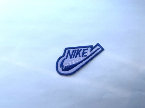 Sports badge logo swoosh 7x - logo,