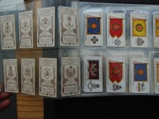 ONE COMPLETE SET CIGARETTE CARDS PLAYERS REGIMENTAL STANDARDS AND CAP BADGES