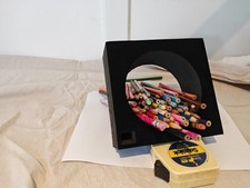 A COLLECTION OF COLOURED  PENCILS