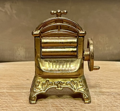 Vintage brass miniature doll - brass,