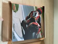 DUCATI CORSE 1999 YEARBOOK HB CARL FOGARTY TROY CORSER. Brand New In Box