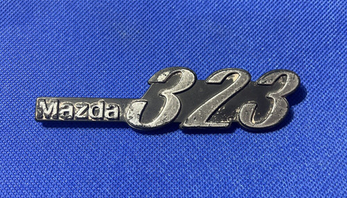 Mazda 323 badge - 323,