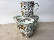 4 Coffee Mugs With Hand