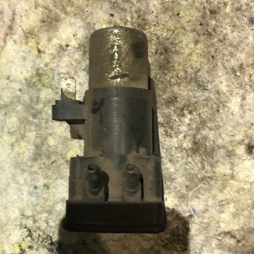 Headlight washer pump for