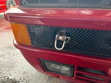 Lancia Delta Integrale 82469688 LEFT front bumper grill Evo 2 Toe Hook hole OEM