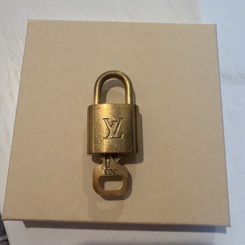 Louis vuitton lock - louis,