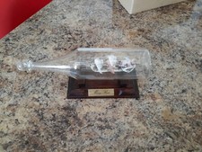 GLASS SHIP "THE MARY ROSE" GOLD LEAF  SAILS ON A WOODEN STAND  5 1/2 BY 2 3/4 "