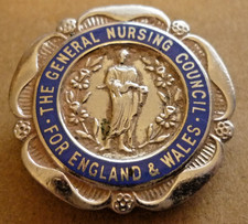VINTAGE ENAMEL BADGE GENERAL