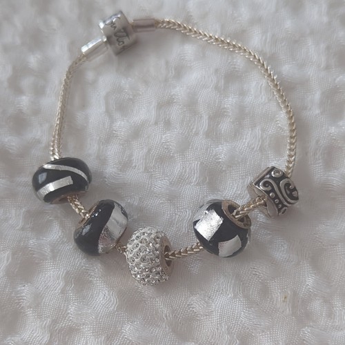 Rhonda sutton silver - sutton, charm