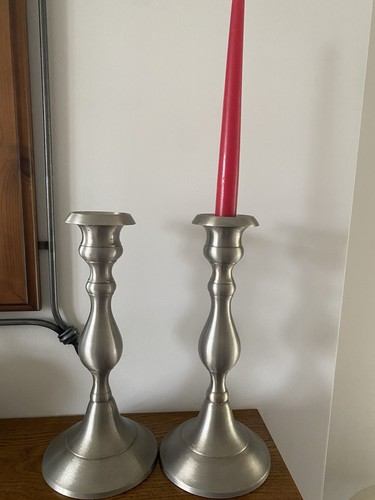 Two metal candle sticks - metal,