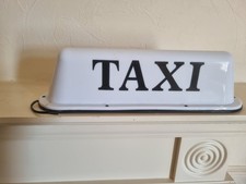 Taxi Sign Up The Roof Top
