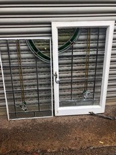 Pair of reclaimed leaded Glass