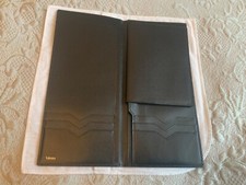mens Valextra slim travel wallet kited with a detachable passport holder