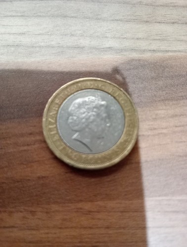 King james bible pound coin - 2,