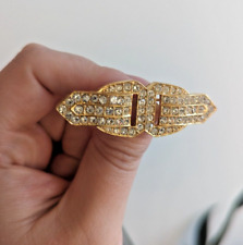 Vintage gold tone sparkly sphinx signed brooch. Art deco style.